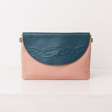 Leather Clutch Hybrid: from coffee runs to cocktails.