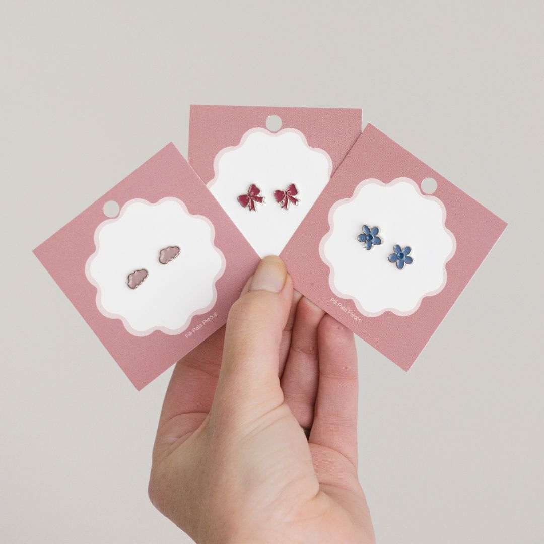 Magenta Bows: Sweet Teeny Tiny Studs.
