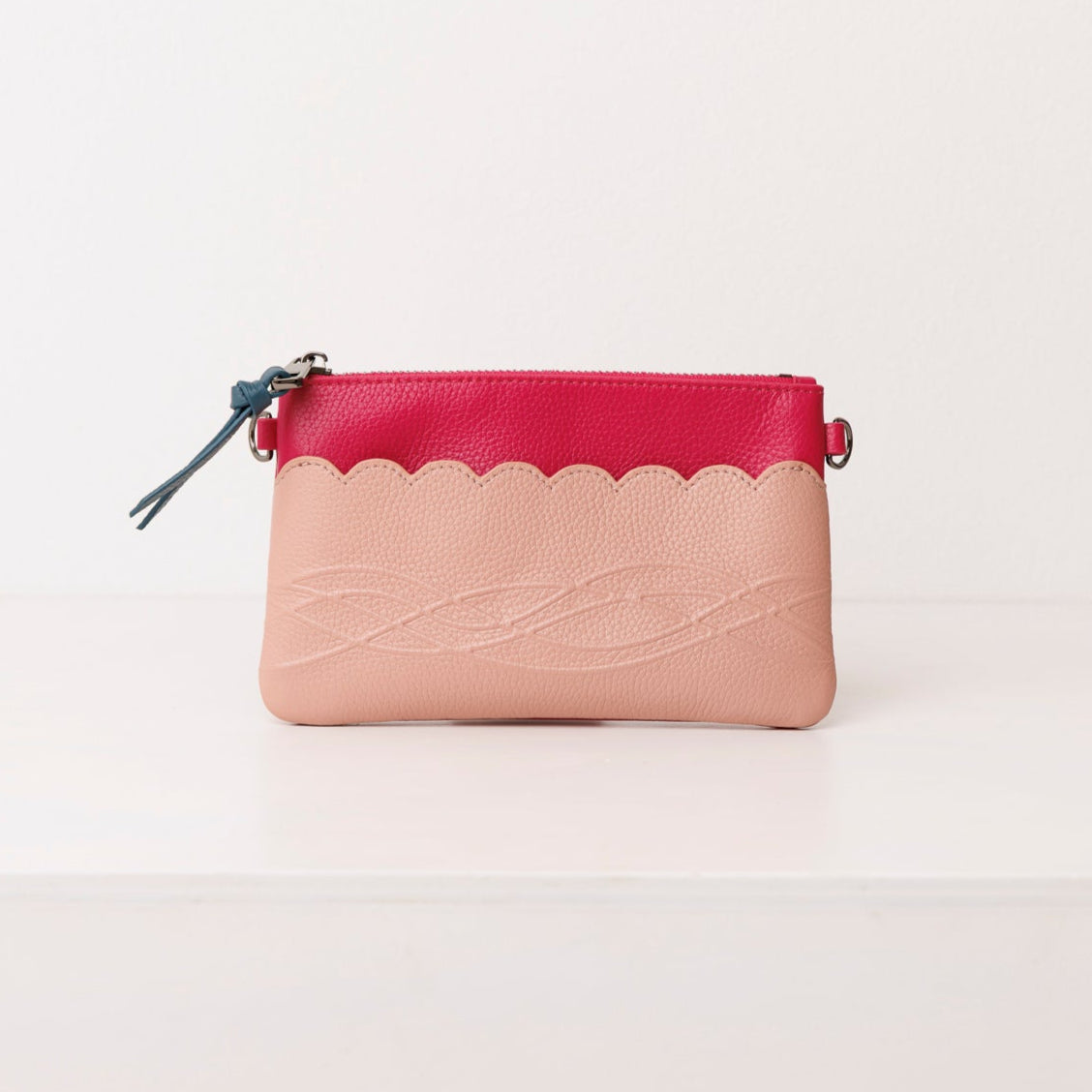 Raspberry leather pouch. Scallop Collection.