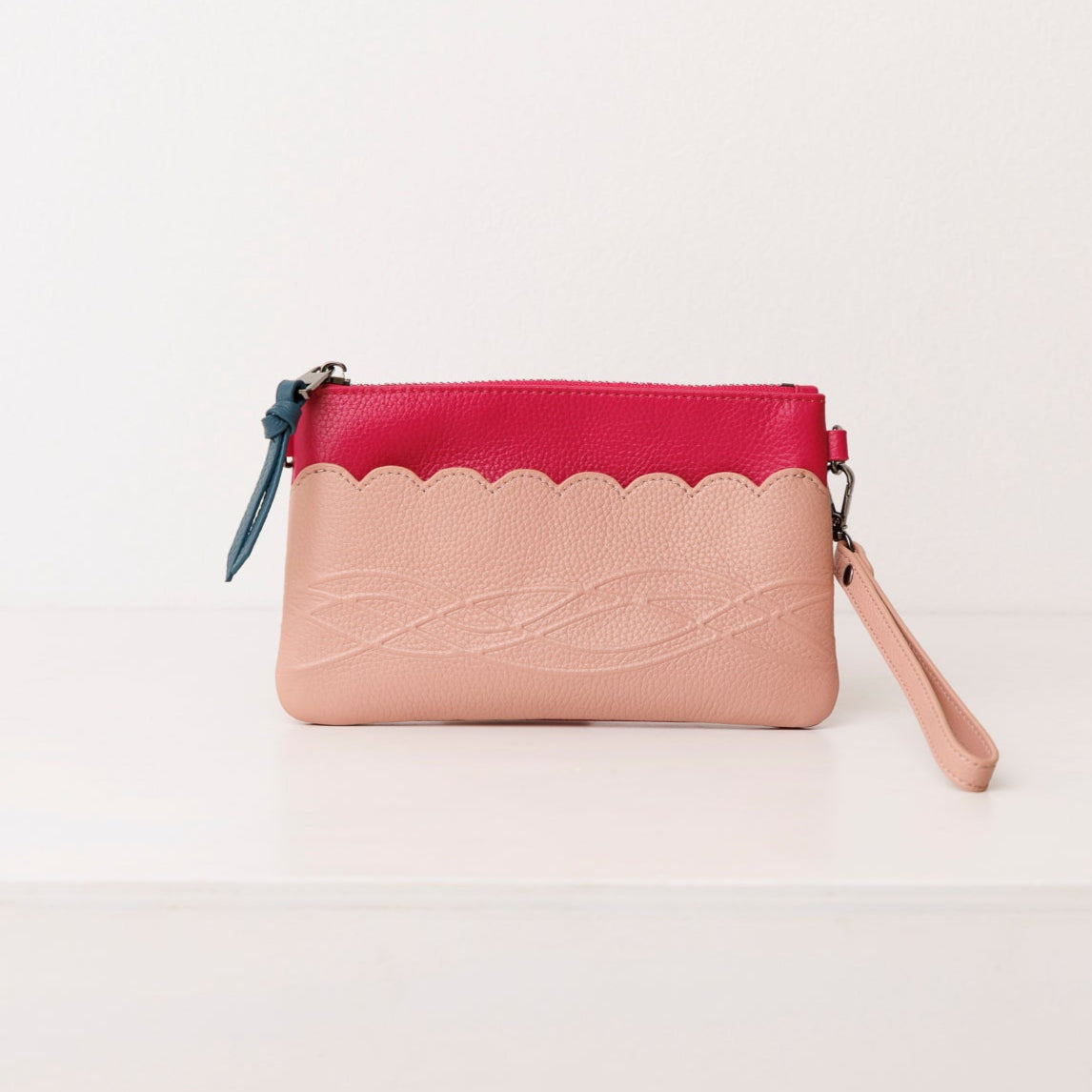 Raspberry leather pouch. Scallop Collection.