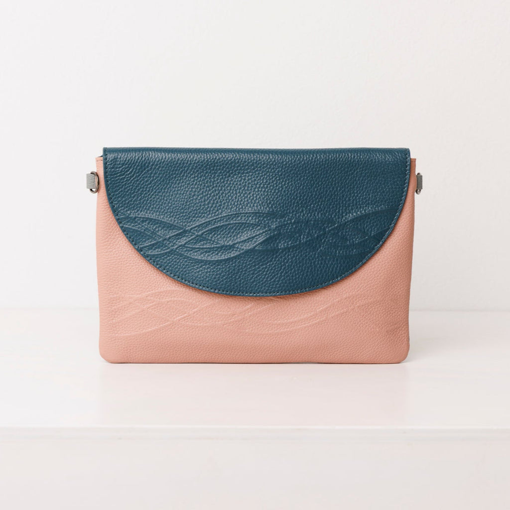 Leather Clutch Hybrid: from coffee runs to cocktails.