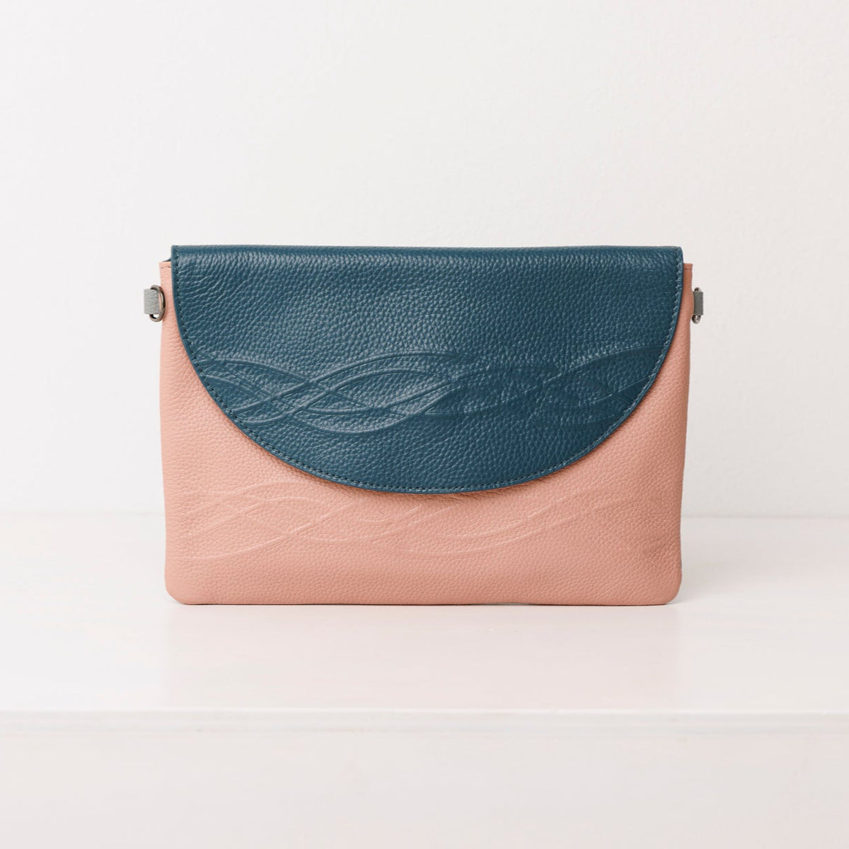 Leather Clutch Hybrid: from coffee runs to cocktails.