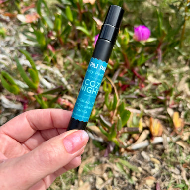 Fragrance for felt flowers. Black spray bottle with blue tag. Cozy nights.