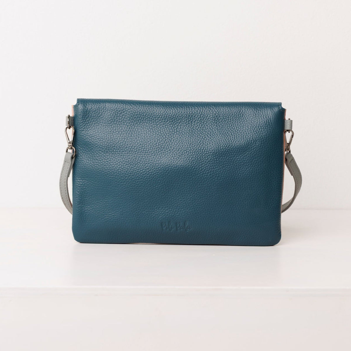 Leather Clutch Hybrid: from coffee runs to cocktails.